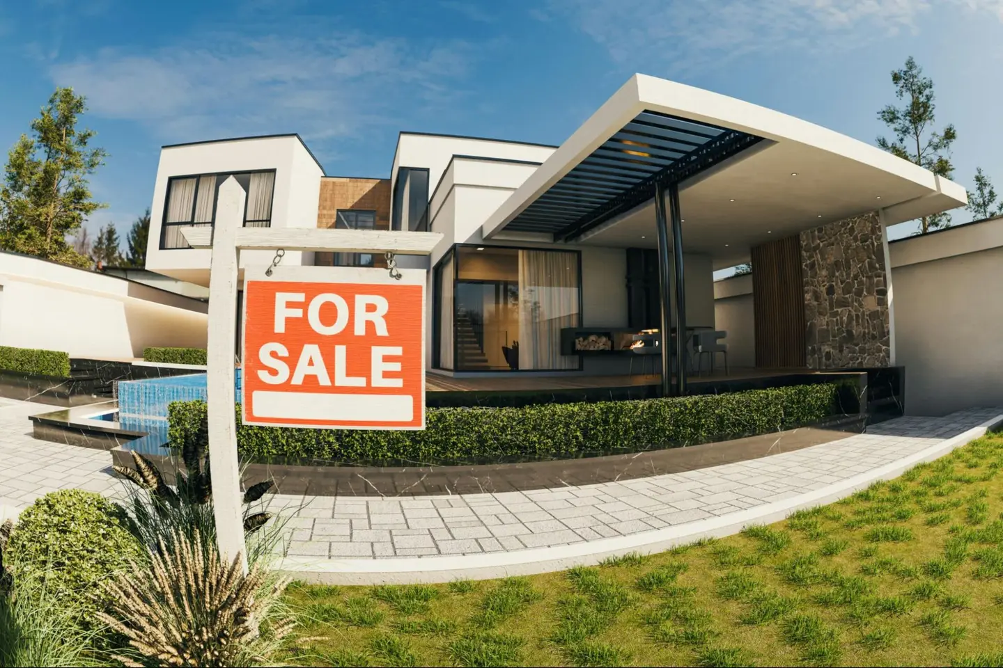 A modern home with a for-sale sign out front